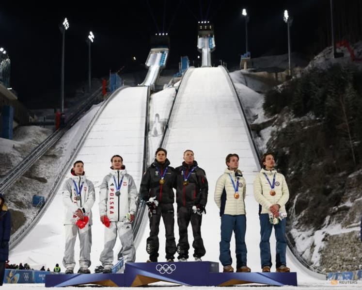 Ski jumping-Austria prevail in chaotic super team final disrupted by snow