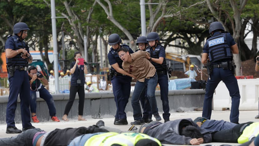 The Big Read: Gunfire on Paris streets sends a jolt halfway around the world