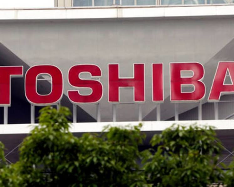Japan's Toshiba president steps down amid acquisition talks