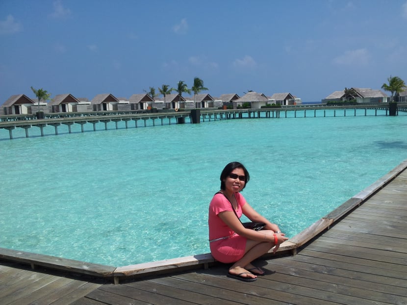 The author, seen here in this 2013 photo in Maldives, resigned from her job as an inbound travel agent in July due to the impact of Covid-19. She returned to Indonesia on Aug 14 and has been jobless since.
