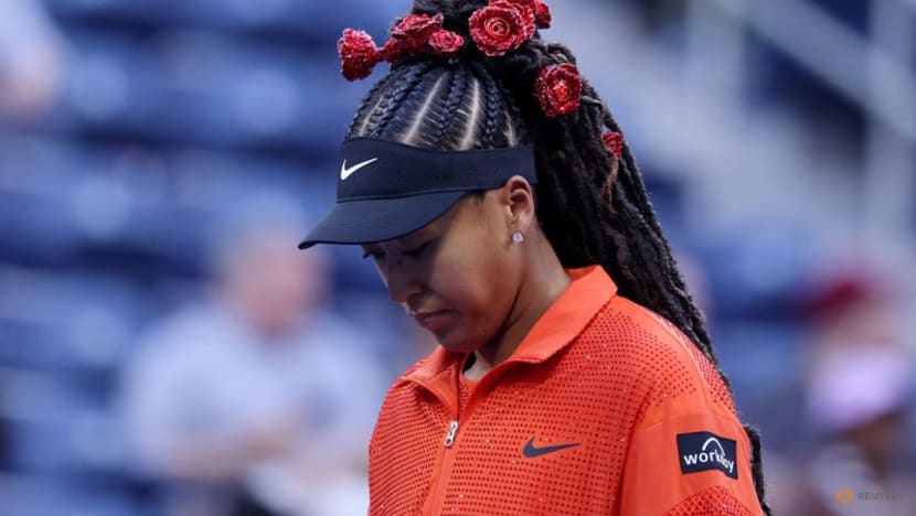 Resplendent in red, Osaka races into US Open second round