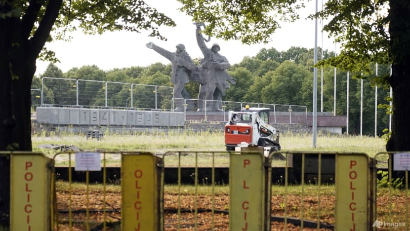 Soviet-era monument's iconic obelisk comes down in Latvia