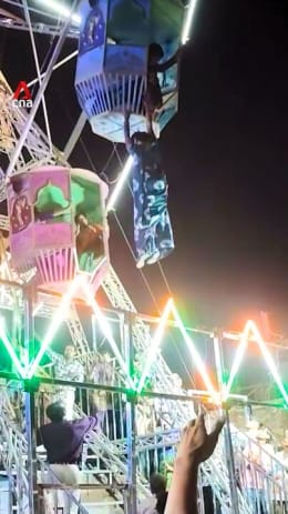 Woman rescued after dangling from Ferris wheel ride in India
