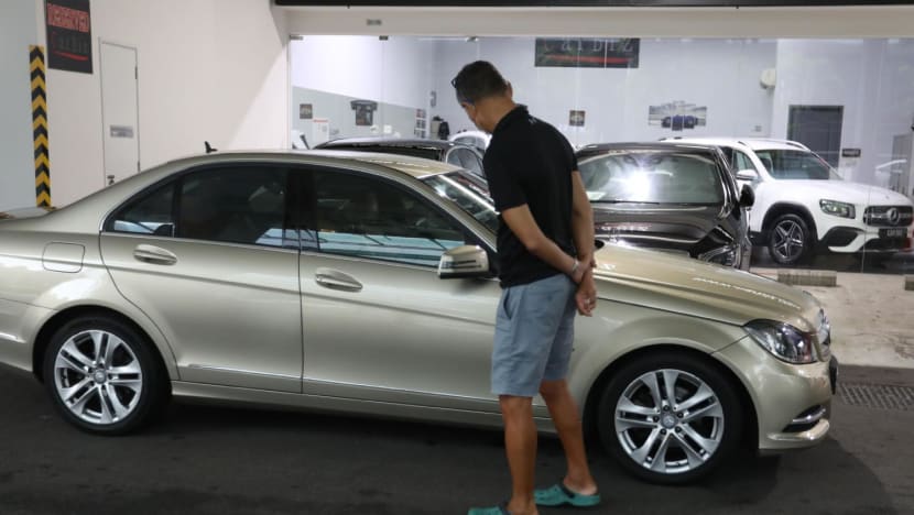 As COE prices for large cars hit S$100,000, car dealers say firm demand will likely keep prices high