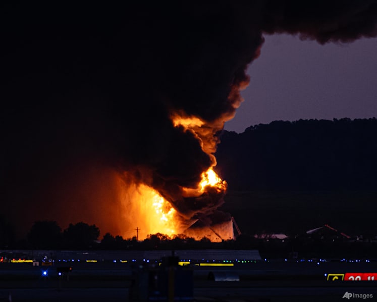 At least seven dead after UPS plane crashes in fireball on takeoff from Kentucky