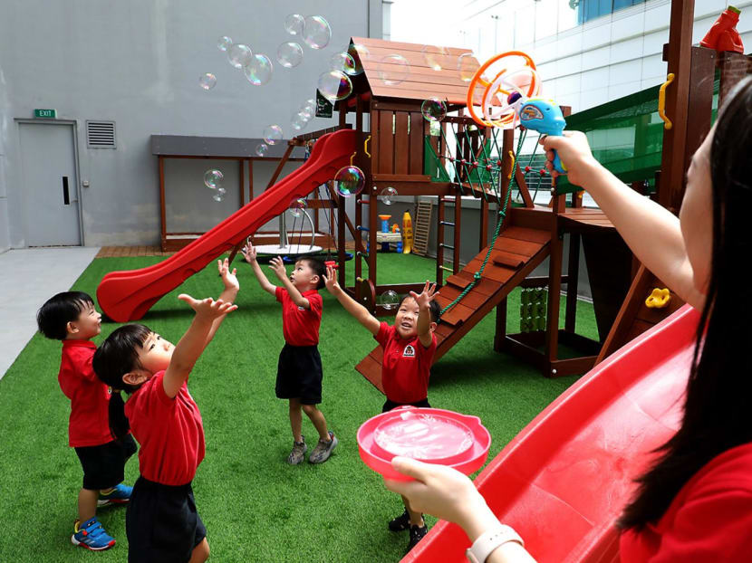 Children at an outdoor playground at Maple Bear preschool at Mediapolis on Sept 7, 2023.