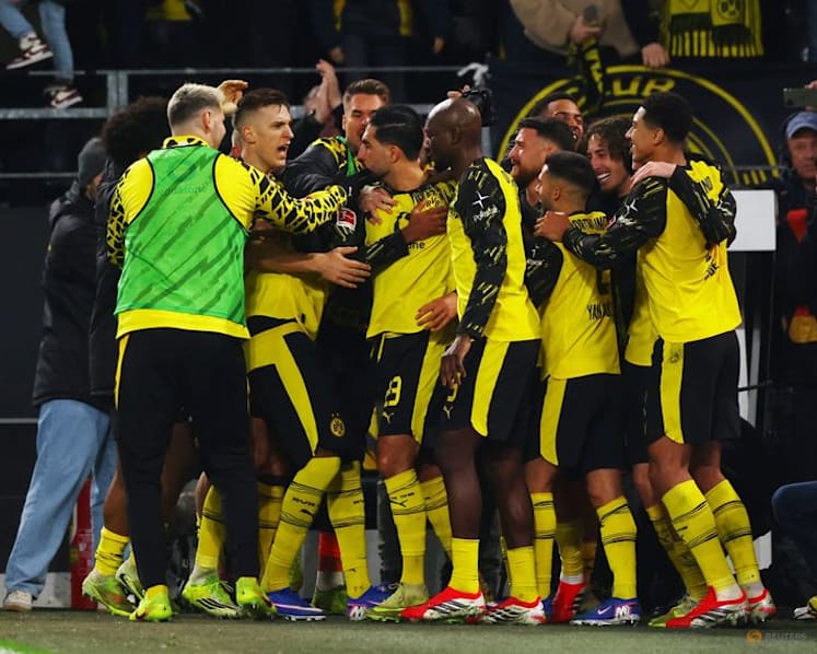 Dortmund waste two-goal lead but score stoppage-time win over St Pauli