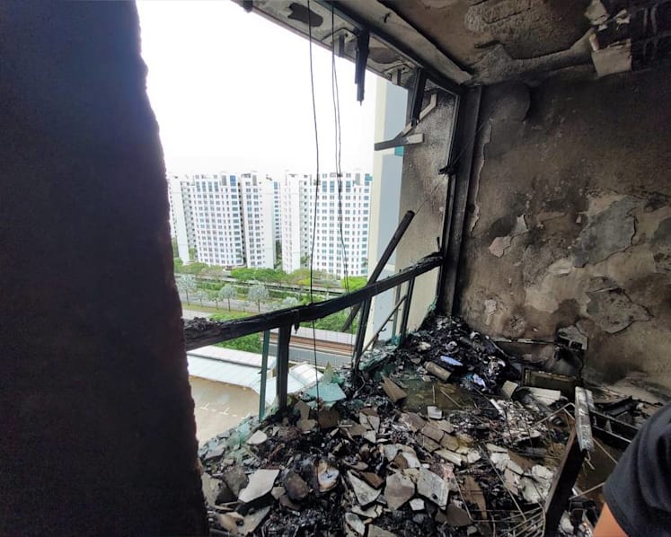 Fire at Woodlands HDB block shatters windowpanes; 50 people evacuated