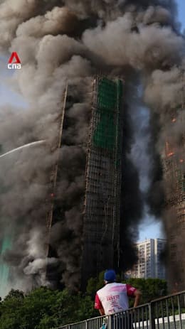 Massive fire at Hong Kong housing estate leaves at least 4 dead