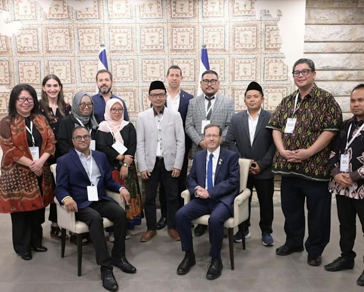 Indonesian government distances itself as meeting of five Islamic activists and Israel’s president draws condemnation
