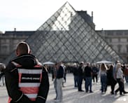 Louvre reopens after jewel heist, Macron orders tighter security