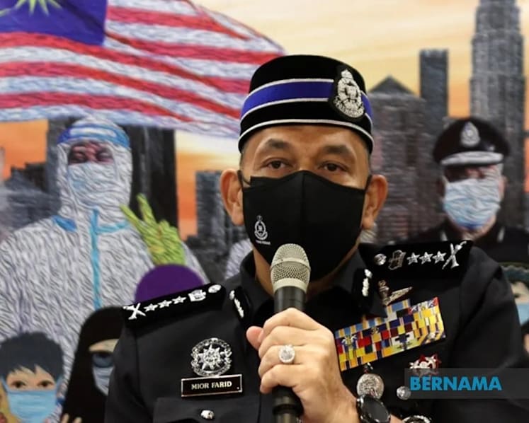 Malaysian police to seek heavier charges against suspect who allegedly assaulted security guard with table