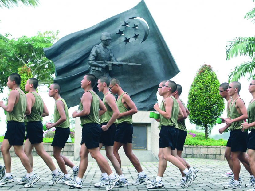 MINDEF is considering requiring fitness programmes for pre-enlistees if they fail to get silver in the NAPFA test. TODAY file photo