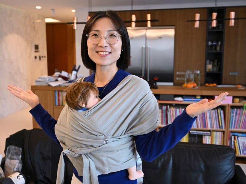Ms Erin Lim, CEO of baby products company Konny, demonstrating a baby carrier during an interview with AFP at her home in Seoul. Ms Erin Lim, CEO of baby products company Konny, demonstrating a baby carrier during an interview with AFP at her home in Seoul.