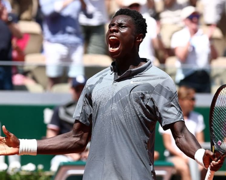 French teen Kouame reaches French Open third round in five-set thriller