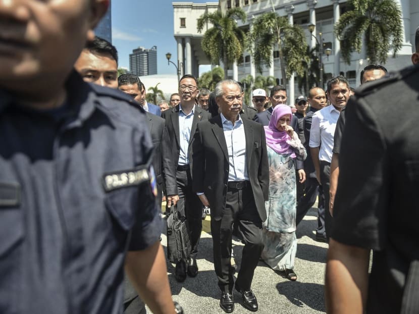 Former prime minister of Malaysia and Perikatan Nasional (PN) chairman Muhyiddin Yassin walks outside Kuala Lumpur High Court after being charged with corruption on March 10, 2023. Former prime minister of Malaysia and Perikatan Nasional (PN) chairman Muhyiddin Yassin walks outside Kuala Lumpur High Court after being charged with corruption on March 10, 2023.