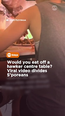 Netizens reacted strongly after spotting a diner picking up noodles directly from a table. #8dayssg #8dayssgtrending #hawkercentre #food #hygiene 