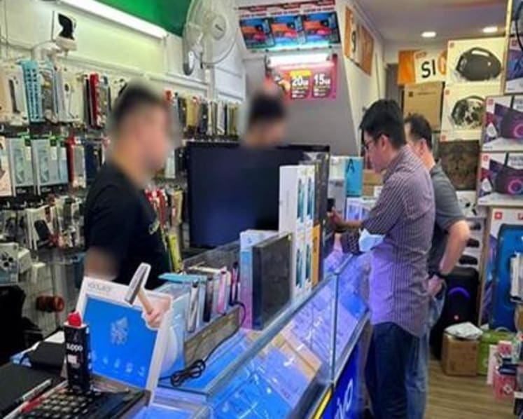 3 arrested at handphone shops over fraudulent registration of postpaid SIM cards for potential criminal use
