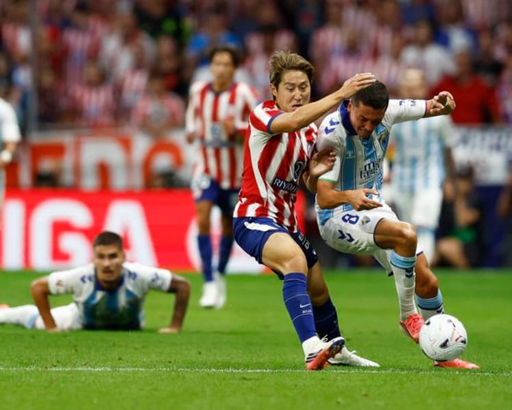 Atletico Madrid beat Malaga but Alvarez absence is felt