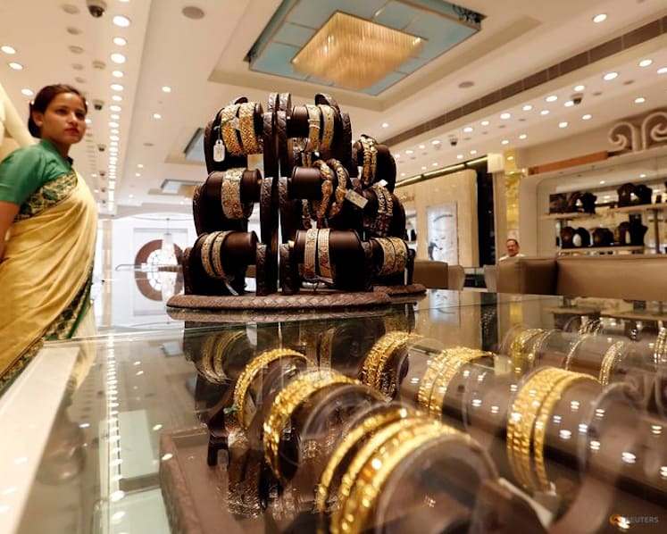 Gold falls below $4,000/oz, silver eases from record high