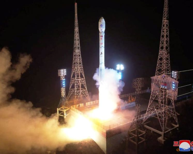 Singapore condemns North Korea's spy satellite launch 