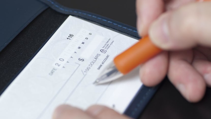'Not sure where my cheque book is': Consumers, businesses unfazed as Singapore aims to go cheque-free