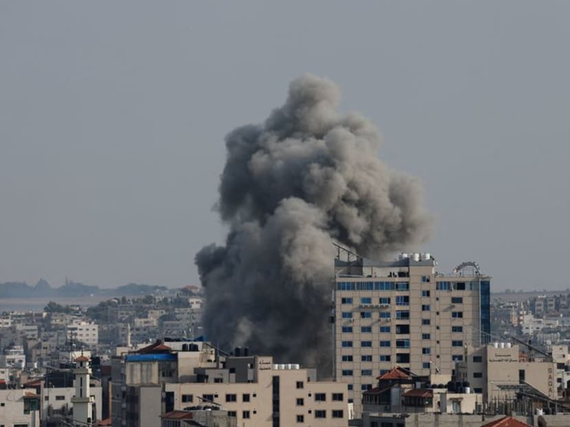 Smoke rises following Israeli strikes in Gaza, on Oct 8, 2023.