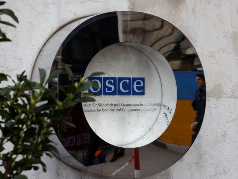 The OSCE sign is seen outside Hofburg Palace as a Parliamentary Assembly of the Organization for Security and Cooperation in Europe (OSCE) takes place in Vienna, Austria, February 23, 2023. REUTERS/Leonhard Foeger/File Photo