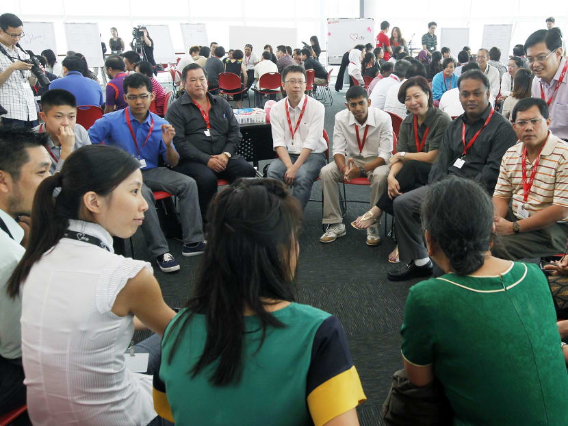 Finance Minister Heng at a session of Our Singapore Conversation in 2012. The author says that at some point, the Government may need to weigh the risk of fatigue for these kinds of national conversations.