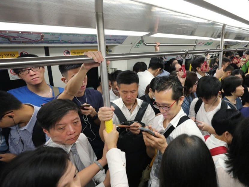 Commuters crowd into an MTR train on October 16 as the system was hit by its worst ever breakdown. Passengers faced more disruption on Thursday (Oct 25).