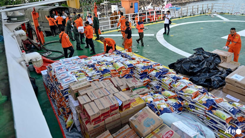 Race to get aid to Asia flood survivors as toll nears 1,200