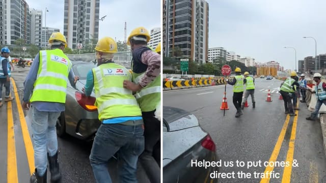 车子突抛锚获客工帮推车 车主：非常暖心 
