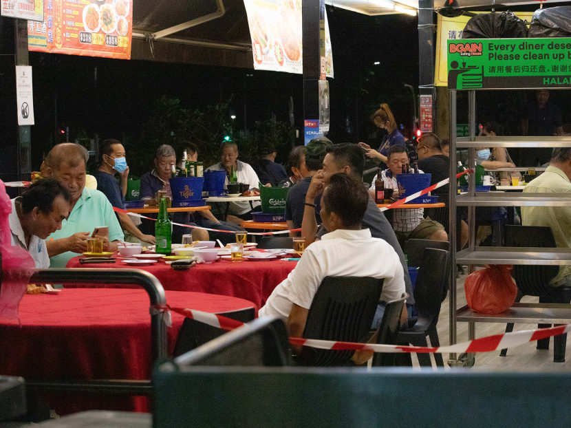 A cordon has been put up around a small section in front of a stall at Bgain 681 Old Street Coffee House, for patrons of the stall to eat and drink in groups of five from 5pm to 10pm daily.