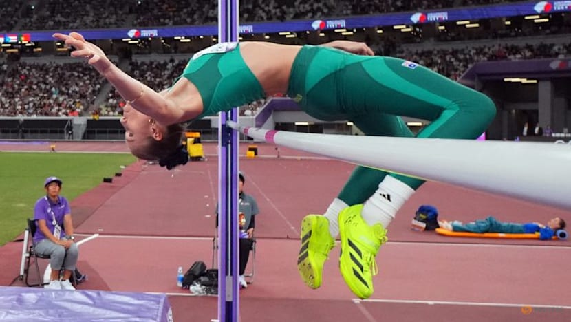 Australian Olyslagers wins high jump after long rain delay