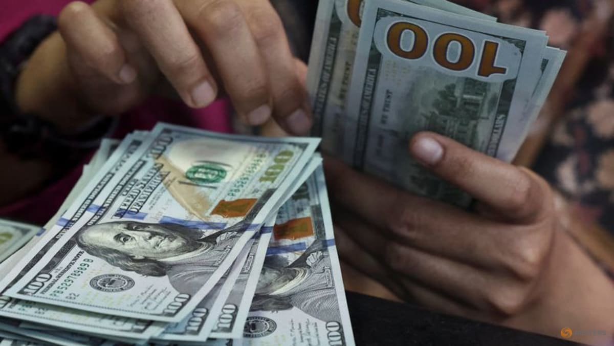 Dollar holds gains on economic data, Fed bets; Aussie advances before RBA