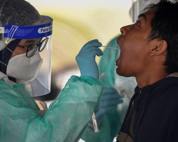 Malaysia reports 20,889 new COVID-19 cases, breaking record for 3rd straight day