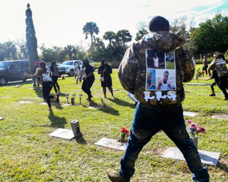 Mother of slain Florida teen shot during burial service