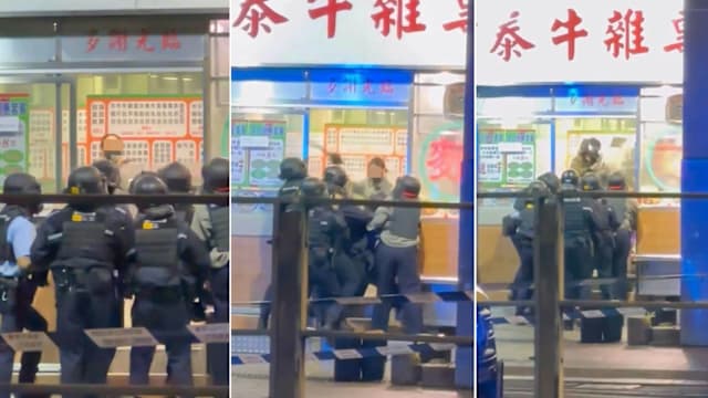 疑手机没电无法付款而失控 女子大闹香港餐厅持刀劈警盾