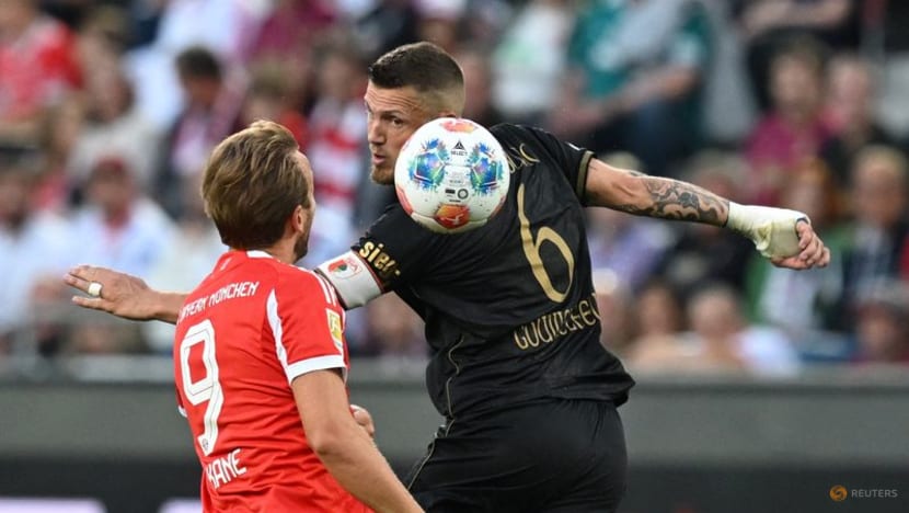 Bayern concede twice again but hold on for 3-2 win at Augsburg