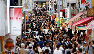 Japan proposes record budget spending while curbing fresh debt