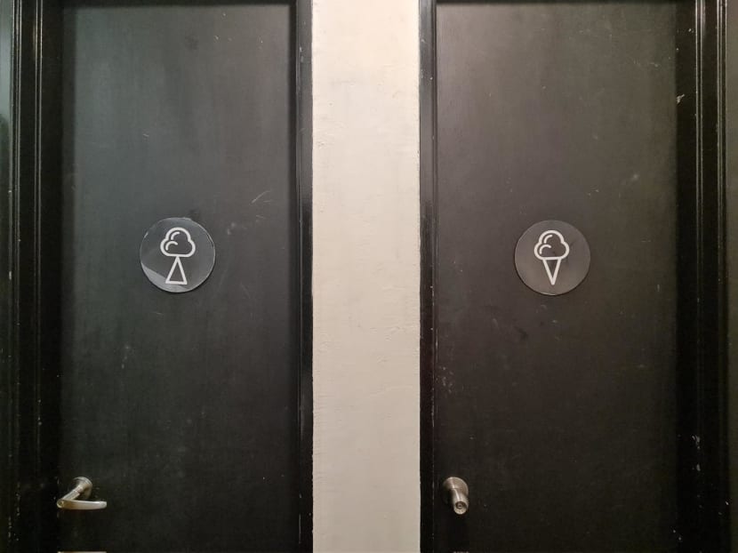 A pair of bathroom signs in Selangor, Malaysia went viral online, confusing netizens with its cloud and triangle symbols