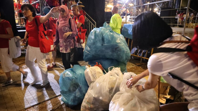 ‘Less trash’ left behind at NDP 2019, but empty plastic bottles, food wrappers among litter lying around