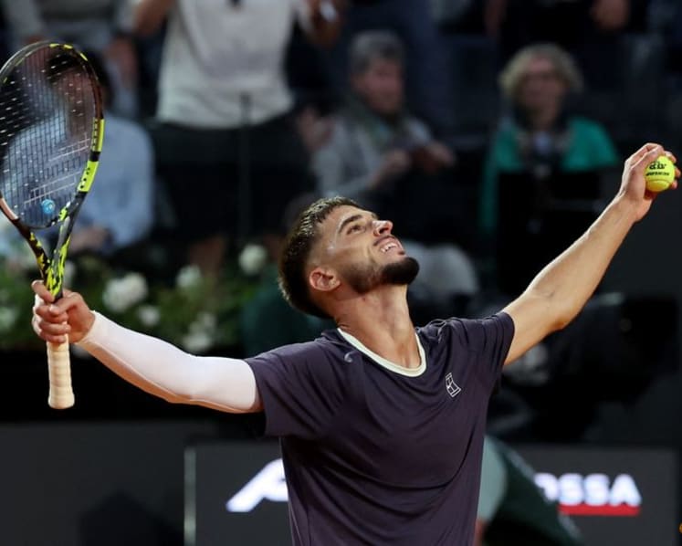 Prizmic stuns idol Djokovic at the Italian Open