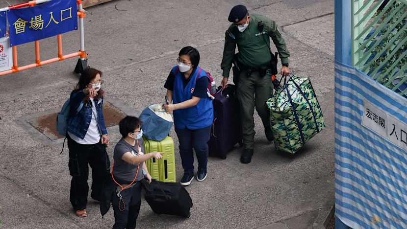 A week after Hong Kong's deadly fire, some residents return for belongings