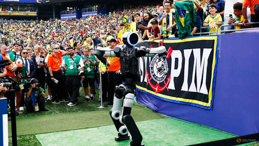 Atlas, the humanoid robot, delivers match ball at World Cup