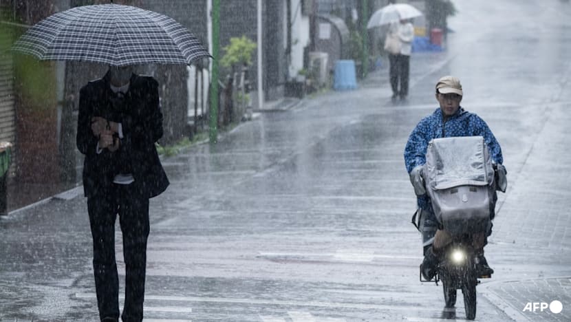 Tropical storm Jangmi batters Japan, cuts power to 60,000 homes