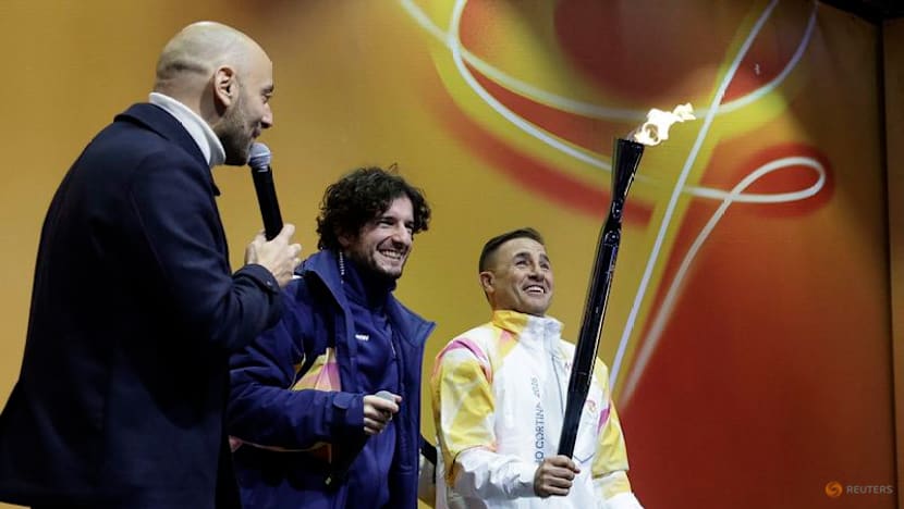 Flame reaches Italian city of Bologna a month before the Games begin