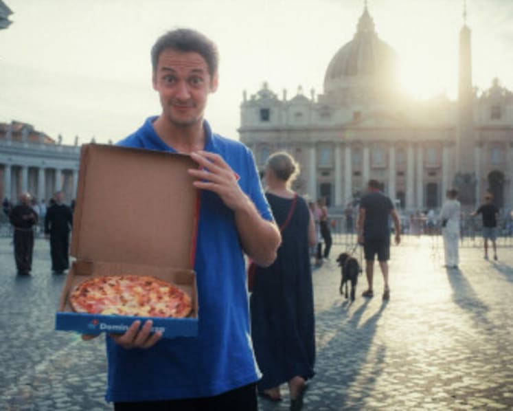 Domino’s delivers the world’s most controversial pizza through the Holy Door of St. Peter’s Basilica