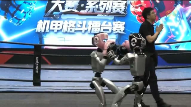 浙江杭州举办机器人擂台拳击赛 反映计算突破成果