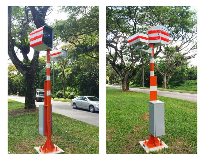 The new brightly-painted digital speed cameras will complement the mobile speed laser cameras, which are already in place at six of the 11 locations around Singapore. PHOTO: SINGAPORE POLICE FORCE